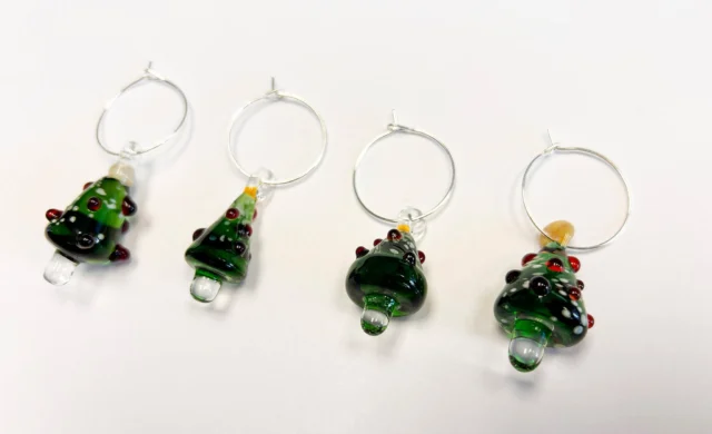 In this flameworking class, you will make a holiday tree charm!  This can also be made into a pendant.This class is for all levels, and no prior experience is necessary. Ages 12 and older. Approximately 1 hour. $35 per person. Reservations are required by phone (513-751-3292) or email (neusoleglassworks@hotmail.com,) or in person. Payment is required at the time of scheduling. Available for pick-up in approx. 7 days. #neusoleglassworks #holiday #tree #charm #glassclass