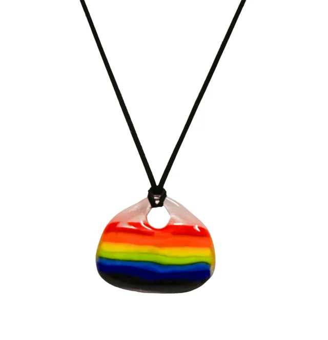 Fused Rainbow Pendant Class! This class is for all levels and no prior experience is necessary. All ages. Class lasts up to 30 minutes. One pendant for $30 per person. Two pendants for $45. Reservations required by phone (513-751-3292) or email neusoleglassworks@hotmail.com or in person. Payment required at time of scheduling. Available for pick-up in approx. 7 days. Approx. 2” tall 2.5” wide. 
#neusoleglassworks #pride #pendant #rainbow #nonprofit