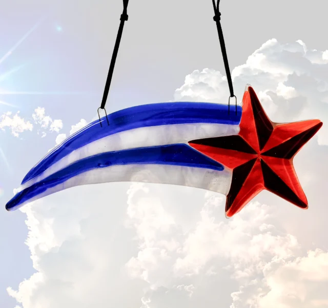 Create your own fused glass Shooting Star suncatcher.  Please call 513-751-3292 between Wednesday and Sunday to schedule, or email neusoleglassworks@hotmail.com

Price is $65 and it will take approximately one hour. This suncatcher will be ready for pick up in about 7 days. Payment is due at time of scheduling. All ages welcome, no experience needed. #neusoleglassworks #america250 #shootingstar #redwhiteblue