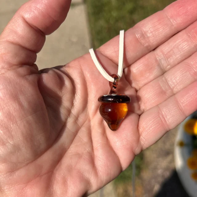 This flameworking pendant class is for all levels and no prior experience is necessary. Ages 12 and older. Class lasts up to one hour. $40 per person. Reservations required by phone (513-751-3292) or email neusoleglassworks@hotmail.com or in person. Payment required at time of scheduling. Available for pick-up in approx. 7 days. Approx. 1.5” tall .75” wide. #neusoleglassworks #nonprofit #acorn #flameworking #glasspendant #makeityourself